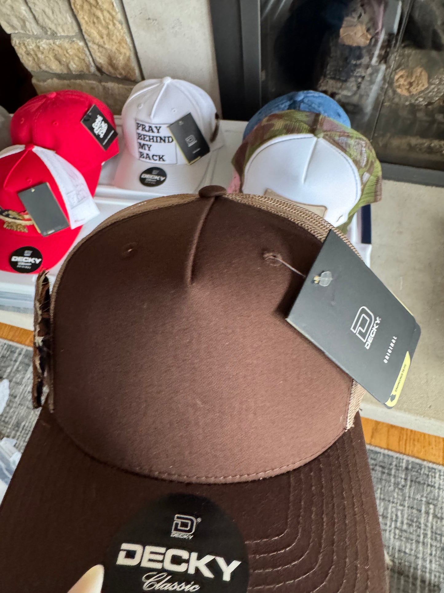 Brown Trucker baseball hat with Feather pin